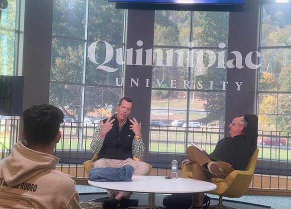 A speaker at the Open Air Studio at Quinnipiac